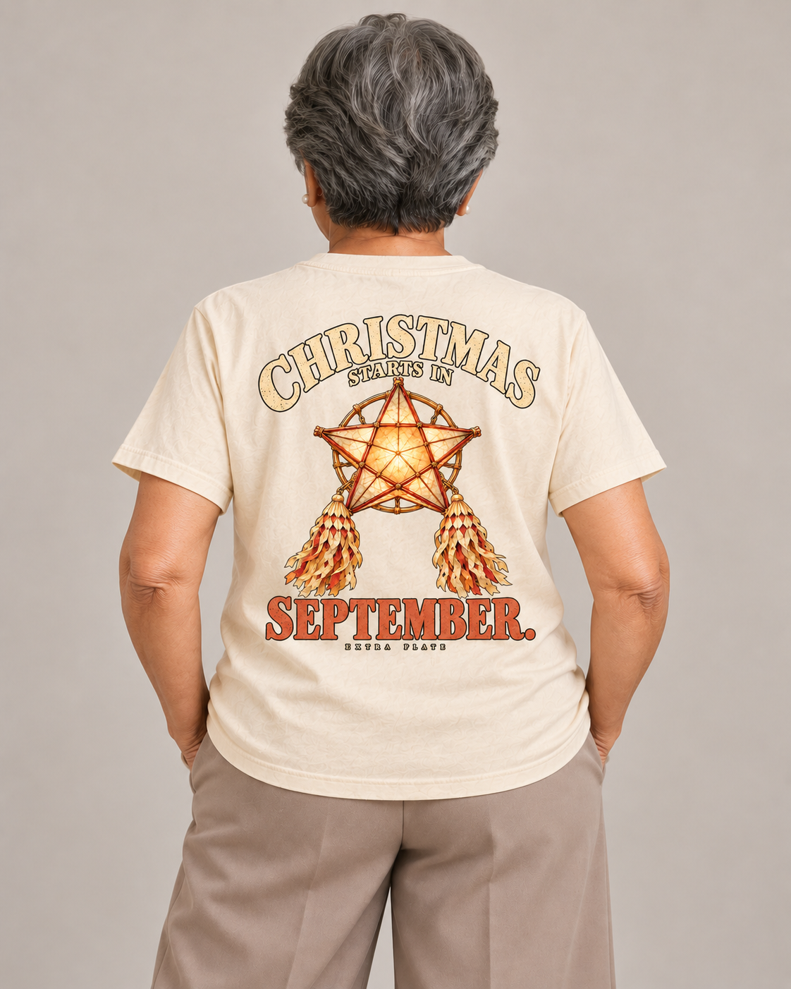 Christmas Starts in September Tee in Barong Cream — model back view